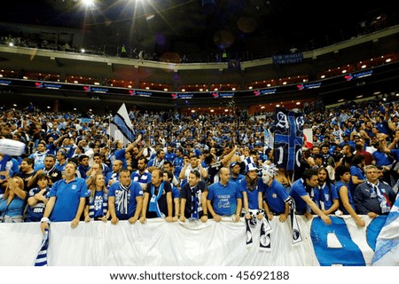 PRAGUE CZECH REPUBLIC APRIL 5 Iraklis team supporters watch the volleyball game of Final Four CEV Indesit Champions League at O2 Arena April 5 2009 in Prague. PRAGUE CZECH REPUBLIC APRIL 5 Iraklis team supporters watch the volleyball game of Final Four CEV Indesit Champions League at O2 Arena April 5 2009 in Prague.
