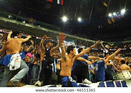 PRAGUE, CZECH REPUBLIC - APRIL 5: Iraklis team supporters watch the volleyball game of Final Four CEV Indesit Champions League at O2 Arena on April 5, 2009 in Prague, Czech Republic.