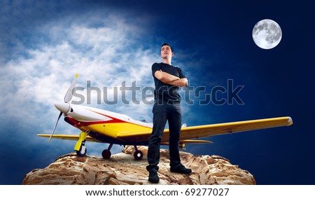 Men with airplane on the top of mountains in night and moon.