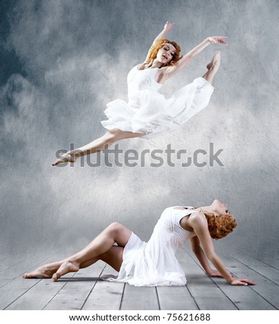 Woman dancer seating posing on background
