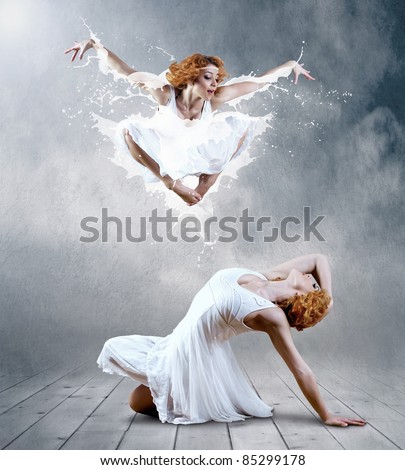 Woman dancer seating posing on background