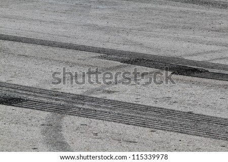 Background with tire marks on road track