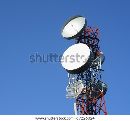 Communication tower over a blue sky
