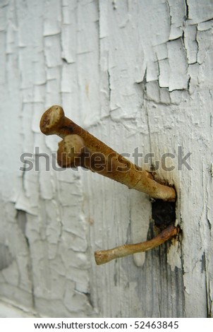 Old Rusty Nails in Wall