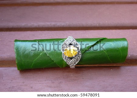 Yellow Gemstone Ring with Green Leaf