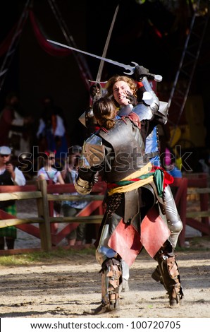 ATLANTA - APRIL 23: Knights duel during the annual Renaissance Festival in Atlanta on April 23, 2012. The festival is a popular annual tourist attraction in the Southeast.