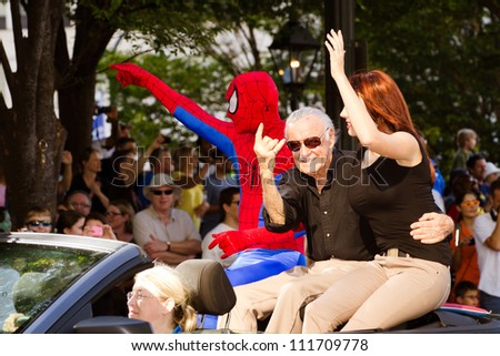 ATLANTA - SEPT. 1: Spider-Man creator Stan Lee waves to the crowd at the annual DragonCon parade on Sept. 1, 2012. DragonCon bills itself as the largest Sci-Fi convention in the world.