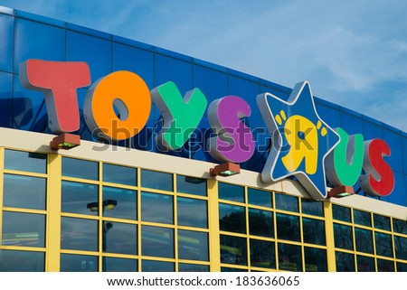 KENNESAW, GA - MARCH 21, 2014: Sign at Toys R Us location in Kennesaw, GA, on March 21, 2014. The retailer announced cuts of 200 jobs at corporate headquarters and plans to close stores nationally.