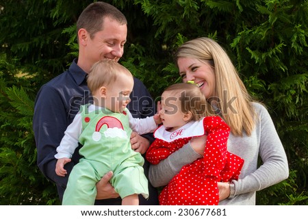 Portrait of family with twin babies
