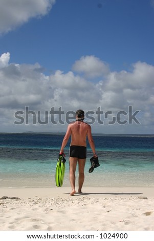 Swimmer about to go snorkeling