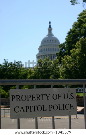Capitol with US police barrier