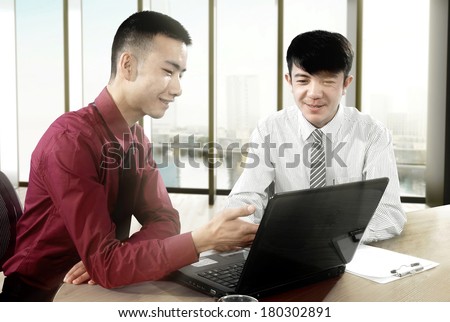 Two young businessman in talk about business