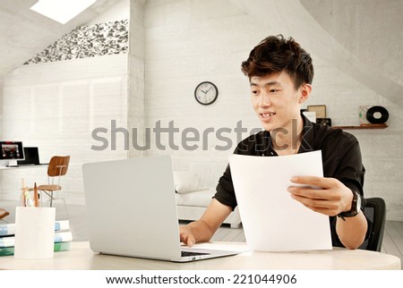 Business people using laptops in the office