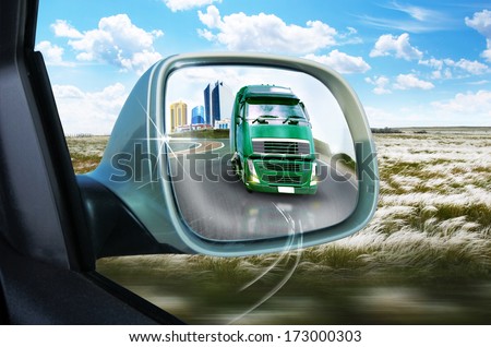 Truck in the rear-view mirror. Collage