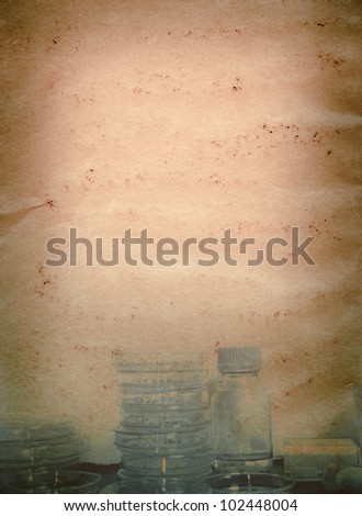 science genetically modified plants test in petri dishes  old grunge paper texture background