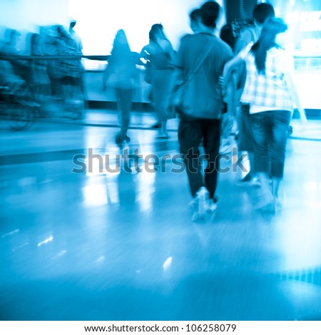 Business passenger crowd at subway station motion blurred abstract