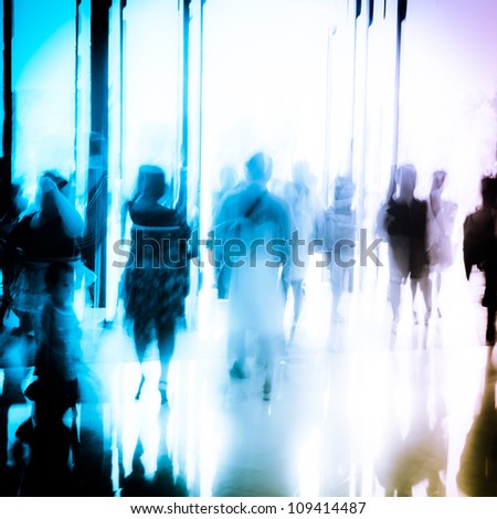 business people activity standing and walking in the lobby motion blurred abstract background
