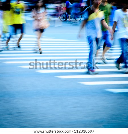 Pedestrians in modern city street