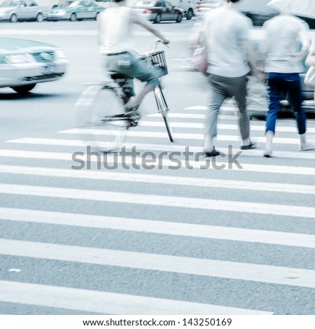 Pedestrians in modern city street