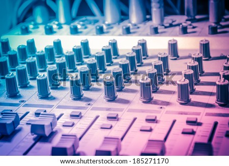 Music studio, sound studio adjusting record equipment