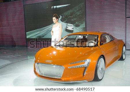 GUANGZHOU, CHINA - DEC 27: Fashion Model on car at the 8th China international automobile exhibition on December 27, 2010 in Guangzhou China.