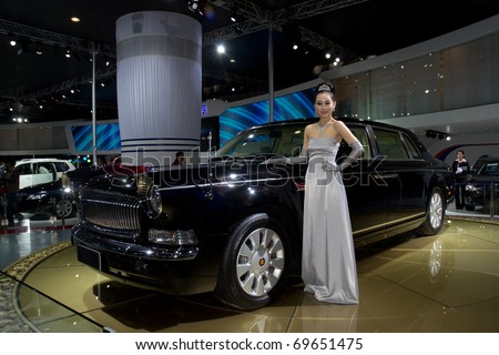 GUANGZHOU, CHINA - DEC 27: Fashion Model on Audi car at the 8th China international automobile exhibition on December 27, 2010 in Guangzhou China.