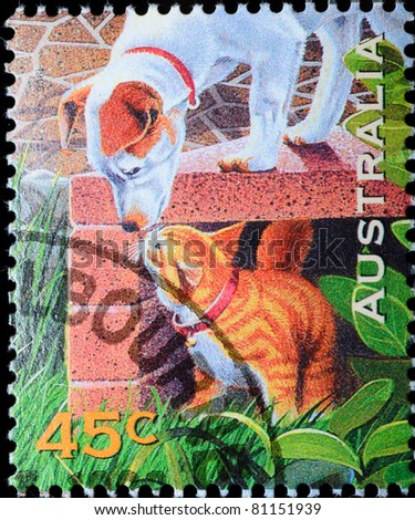 AUSTRALIA - CIRCA 1996: A stamp printed in Australia shows pet dog and cat, circa 1996