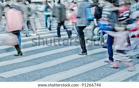 big city person crowd crossing street