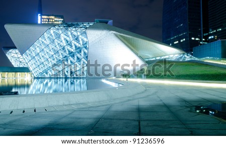 GUANGZHOU, CHINA - NOV. 05: Guangzhou Opera House night landscape on Nov. 05, 2011 in Guangzhou, China. Designed by architect Zaha Hadid and has become one of the seven new landmarks in Guangzhou