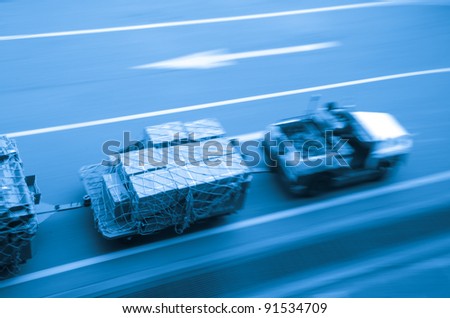 cargo car delivery on airport blur motion