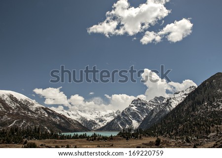 the beautiful lake under the snow mountain?blue sky with white cloud.