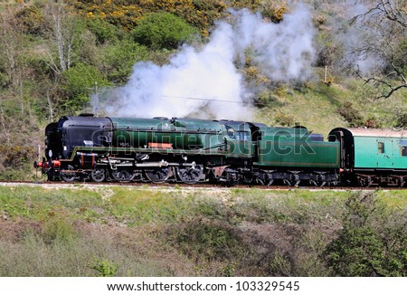 The Age of Steam, Vintage Steam Locomotive on an English Railway Track