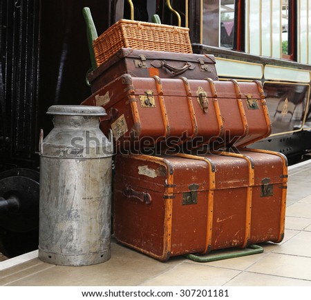 Nostalgic view of old Luggage and Baggage on a Platform Trolley at a Train Station in England