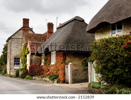 Row of Quaint Cottages in a Rural Village Street in England