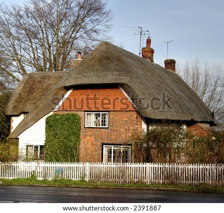Thatched Village Cottage on a Village Street in England