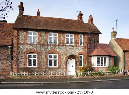 Brick and Flint House on a Village Street in England