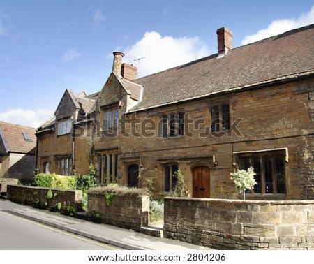 Winter sunshine on a Natural Stone Mullion windowed English Village Houses