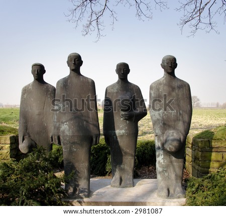 Statues of German Soldiers in a World War One Cemetery in Belgium