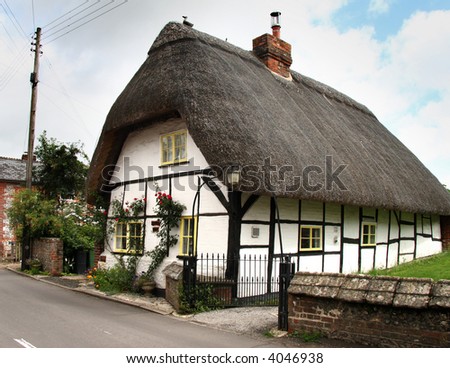 Timber Framed Thatched Cottage in an English Village