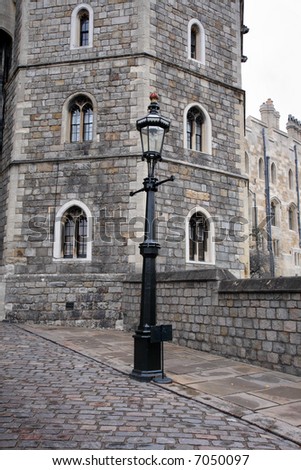 Victorian Style Lamp on Entrance To Windsor Castle In England With A Victorian Street Lamp