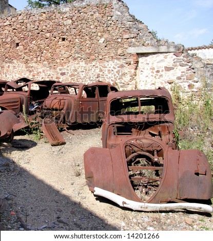 stock photo Old Rusting Car wrecks abandoned in a yard