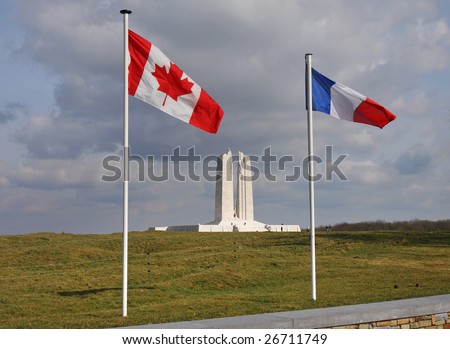 The Vimy World War One War Memorial in France with the Canadian and French Flags