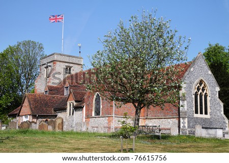 English Village Church and Tower with Union Jack Flag flying