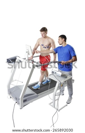 Sports Scientist doing Performance Assessment on Treadmill. Modern Technology.