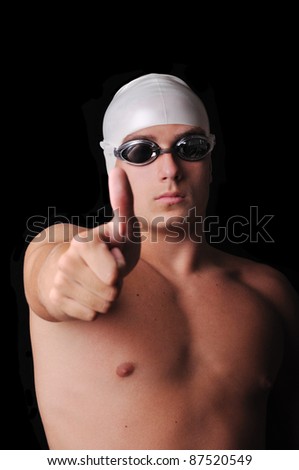 Male swimmer isolated in black