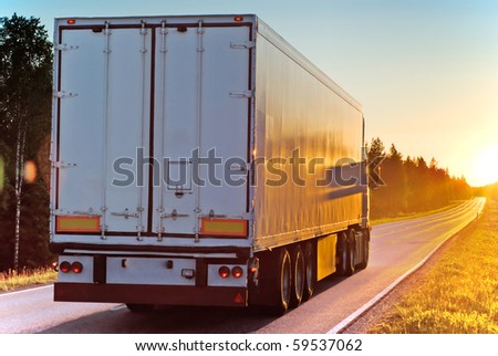 Truck on a road in the evening