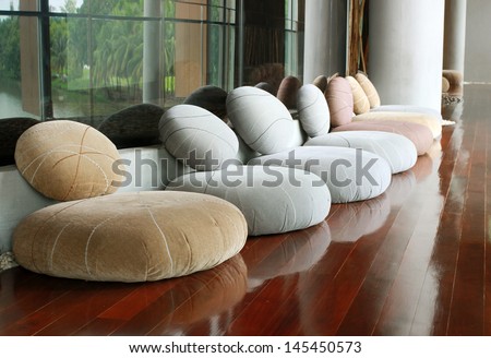 Cushion seat in quiet interior room for meditation