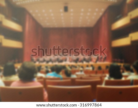 Blurred background of audiences in orchestra symphony theater hall