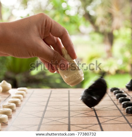 Playing chess game. defeating the opposite team.