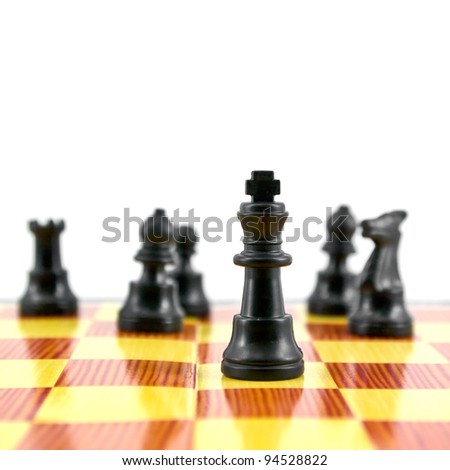 Black chess king, the leader of army isolated on white background